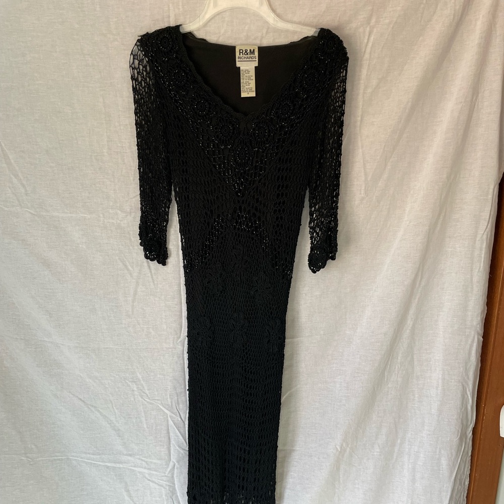 Black crocheted and beaded ankle length dress. beautiful and slimming when on.